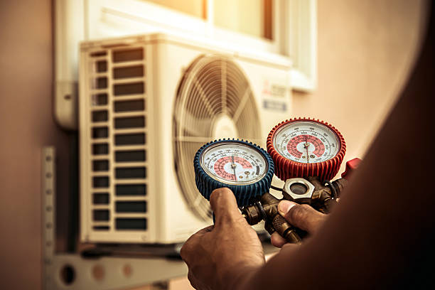 Professional Hvac technician working in Creola, AL